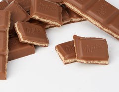 Milka Strawberry Yoghurt Chocolate wrapper, easy to slip into lunch or desk snack.