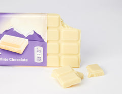 Milka 3-pack on countertop, convenient snack for gatherings.