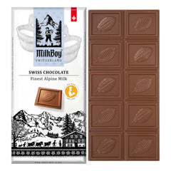 MilkBoy Swiss Chocolates bar close-up shows creamy milk texture for a smooth melt.