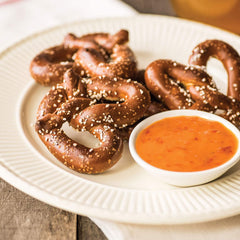 Millers Banana Pepper Mild Hot Sauce dish pairing suggests cheese and burgers.