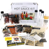 Millhouse Spice Co Premium Hot Sauce Kit shows five peppers for customizable heat and flavor.
