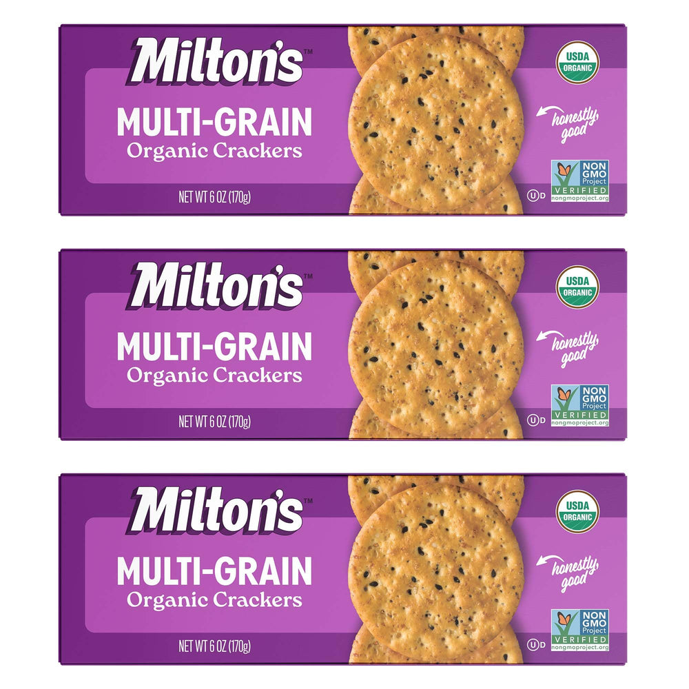 Milton's Craft Bakers multi-grain crackers on a charcuterie board, pairs beautifully with cheeses and spreads.