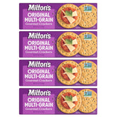 Milton's Craft Bakers Original Multi-Grain crackers displayed on a serving board for elegant entertaining.
