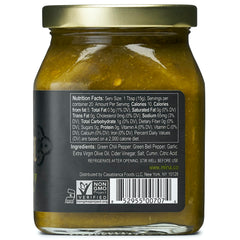 Mina Harissa Green Hot Sauce being poured adds bright heat to meals