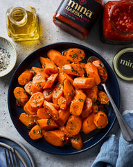 Mina Harissa sauce texture shot shows glossy adaptable consistency for marinades.