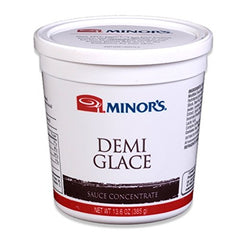 MINOR'S Demi Glace sauce on a plate ready to elevate beef, pork, and veal dishes.