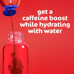 Mio Energy on-the-go bottle resting in a purse for portability.