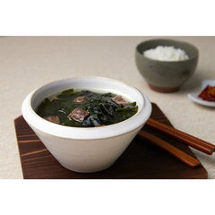 Miyeokguk seaweed soup thick broth served in a bowl with rich texture.