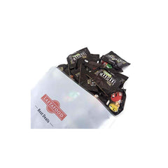 M&M's Milk Chocolate shell close-up highlights colorful shells and smooth centers.