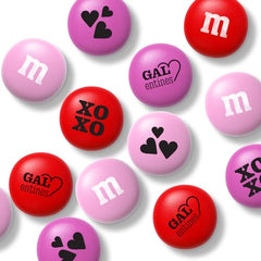 Red and pink M&M’S used as table decor for Galentine’s events.