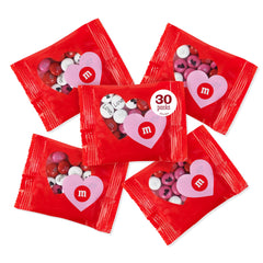 M&M’S WORLD heart favors set showing 30 festive Valentine bags ready for sharing.