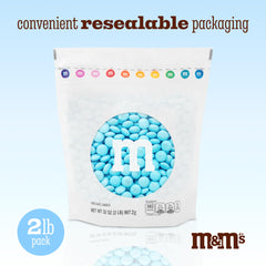 M&M'S WORLD light blue milk chocolate candy for weddings creates a festive bar display.