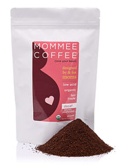 Mommee Coffee decaf ground 11 oz pack showing packaging with smooth caramel flavor