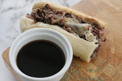 Mom's Place Gluten-Free Au Jus Mix served as dipping sauce for sandwiches.