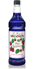 Monin Blue Raspberry Syrup bottle adds vibrant color and bold berry flavor to drinks.