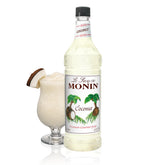 Monin Coconut Syrup bottle for tropical cocktails and desserts.
