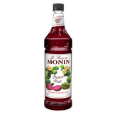 Monin Desert Pear Syrup bottle with bright color for drinks