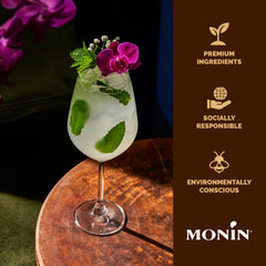 Close-up of Monin Elderflower Syrup label highlighting allergen-free and non-GMO.