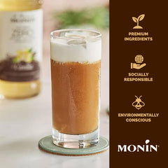 Monin French Vanilla Syrup being poured into a vanilla cocktail for aroma