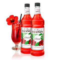 Monin Hibiscus Syrup bottle displaying a floral flavor ideal for cocktails and lemonades.