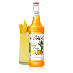 Monin Mango Syrup bottle pour enhances tropical cocktails with mango sweetness