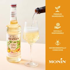 Iced tea glass with Monin White Peach Syrup adding subtle peach sweetness