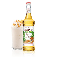 Monin Peanut Butter Syrup bottle pour for a creamy beverage