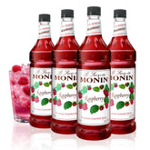 Monin Raspberry Syrup bottle front with vibrant raspberry flavor for cocktails and lemonades.