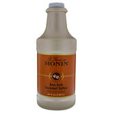 Monin Sea Salt Caramel Toffee bottle; rich, creamy caramel flavor for coffee and desserts.