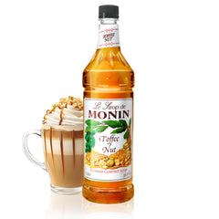 Monin Toffee Nut Syrup bottle closeup highlighting rich coffee flavor enhancement