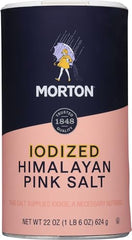 Morton iodized Himalayan pink salt shaker on counter for quick seasoning