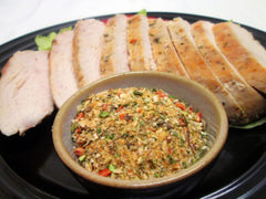 Mrs. Dash Original seasoning sprinkled on fish to boost flavor