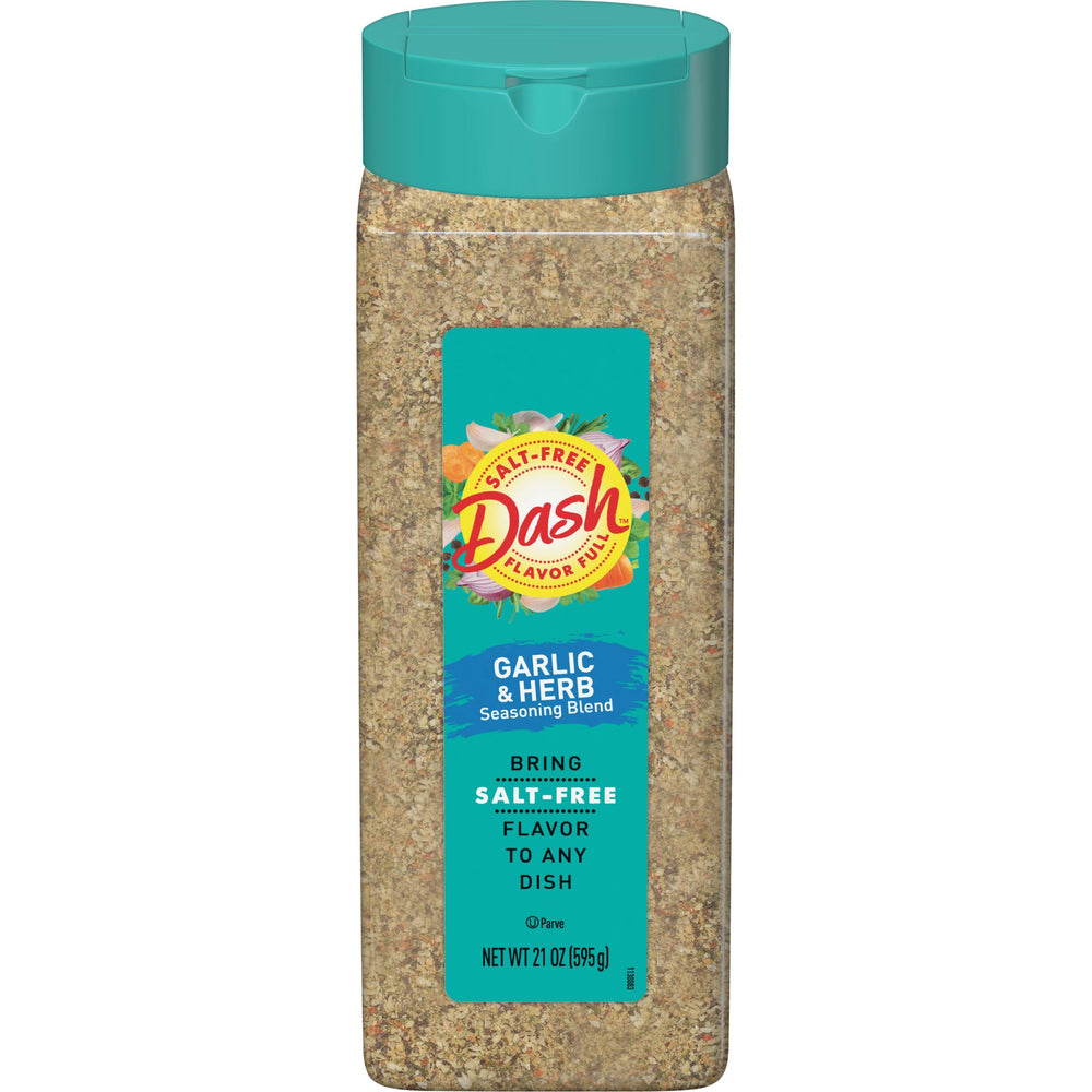 Mrs. Dash Garlic & Herb salt-free seasoning bottle pours flavor into meals.