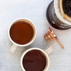 Mt. Comfort Coffee Espresso Roast pour over cup capturing inviting aroma.