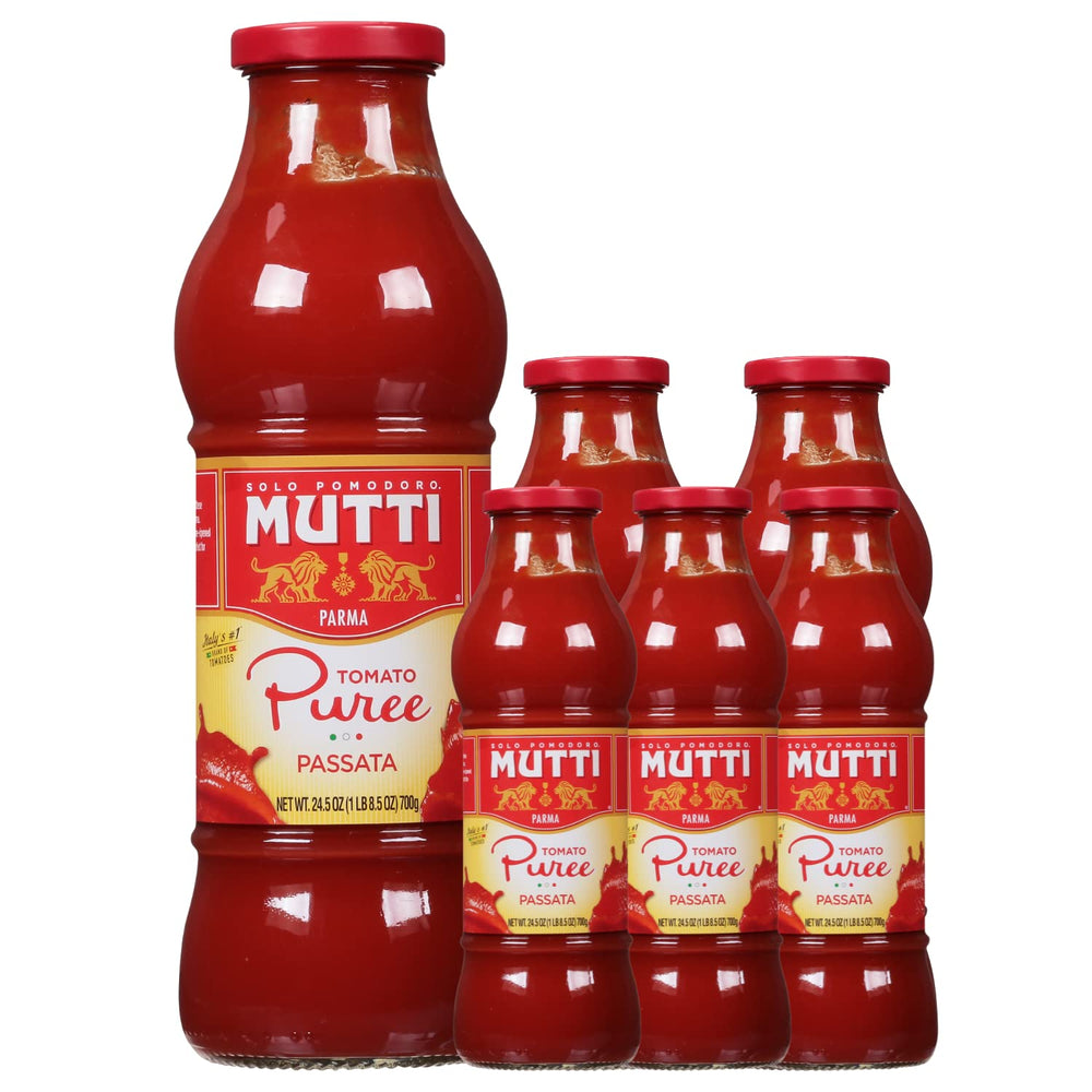 Mutti tomato puree passata glass bottle close-up showing velvety texture for rich sauces.