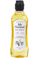 My Normal Allulose Syrup bottle being poured, showcasing syrup-like sweetness with zero calories