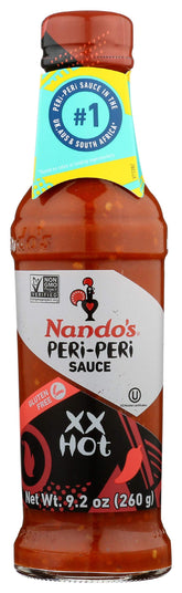 Nando's Peri-Peri Extra Hot bottle pour for bold grilled chicken flavor