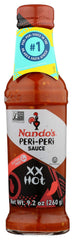 Nando's Peri-Peri Extra Hot bottle pour for bold grilled chicken flavor
