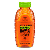 Nature Nate's honey bottle close-up shows organic quality and raw purity for tea sweetness.