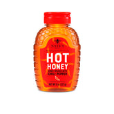 Nate's Hot Honey bottle pour enhances pizzas, cocktails, and drizzle flavor.