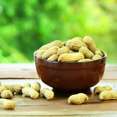 Naturalee peanuts in shell close-up showing pale kernels
