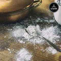 Naturevibe Arrowroot powder scoop in bowl for paleo baking.