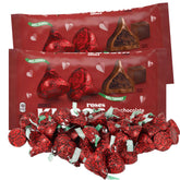 Needzo milk chocolate meltaway kisses in festive rose foil wrappers for gifting and gatherings.
