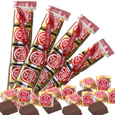 Needzo milk foil chocolate squares ice cubes in four sleeves for gifting.
