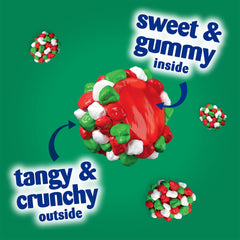 Festive red, green, and white clusters on a holiday table setup.