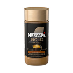 NESCAFE Gold Espresso Instant Coffee canister on a kitchen counter preserving freshness.