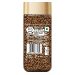 Nescafe Gold whole beans closeup highlighting rich aroma for a smooth brew