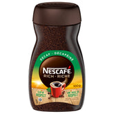 NESCAFÉ Rich Decaf jar 100 g on shelf, ready for caffeine-free mornings.