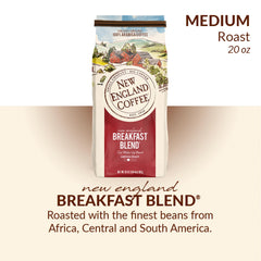 New England Coffee Breakfast Blend steaming cup offers steady wake-up flavor.