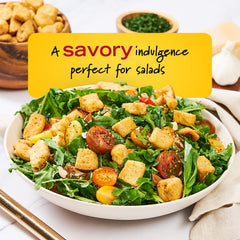 New York Bakery croutons with toasted texture atop a steaming bowl of soup.